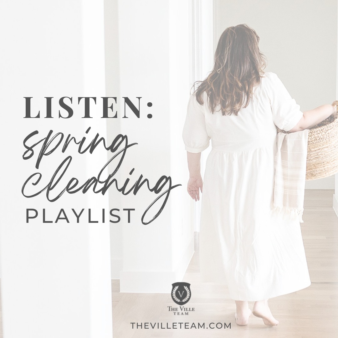 woman doing laundry with words spring cleaning playlist